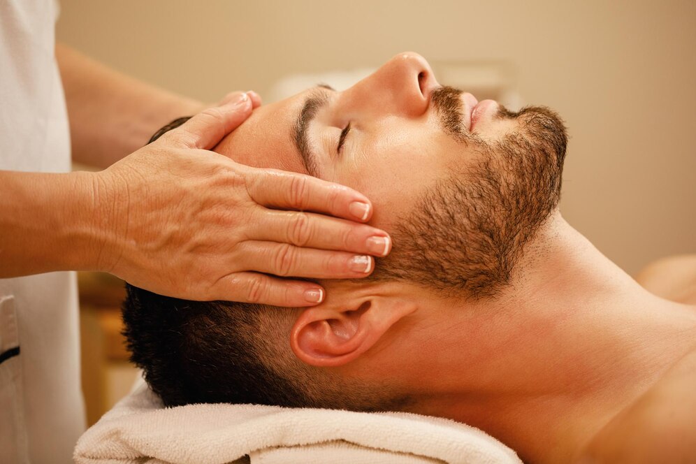 closeup man getting head massage relaxing with eyes closed spa 637285 1721